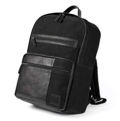 K0023AB | Canvas/Vera Leather Notebook Backpack, full grain, flyaway - Black Color. Nickel Antique accessories, Zipper closure. Dimensions: 29 x 40 x15 cm. Packaging: Tnt bag