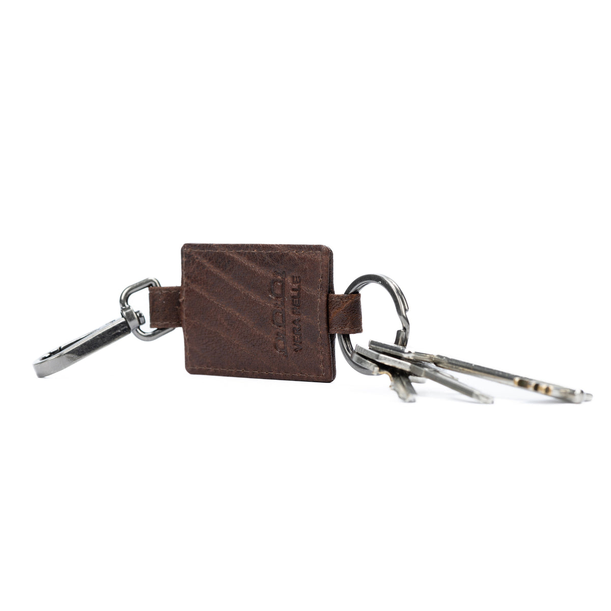 K10650BB | Keychain in genuine full-grain leather, Volanata. Dark Brown color. Nickel Antique Accessories. Total dimensions: 4 x 15 x 0.5 cm. Packaging: hard bottom/cover Gift Box
