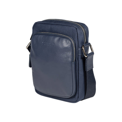 RB2002D | Nylon/Vera Leather Shoulder Bag, with light grain. Zipper closure and adjustable shoulder strap - Blue color - Size: 15.5 x 21 x 7 cm. Packaging: Non-Woven Fabric Bag